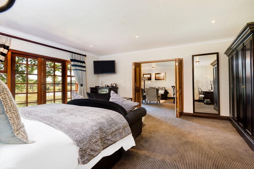 Irene Country Lodge, Autograph Collection Центурион Экстерьер фото A bedroom at the hotel