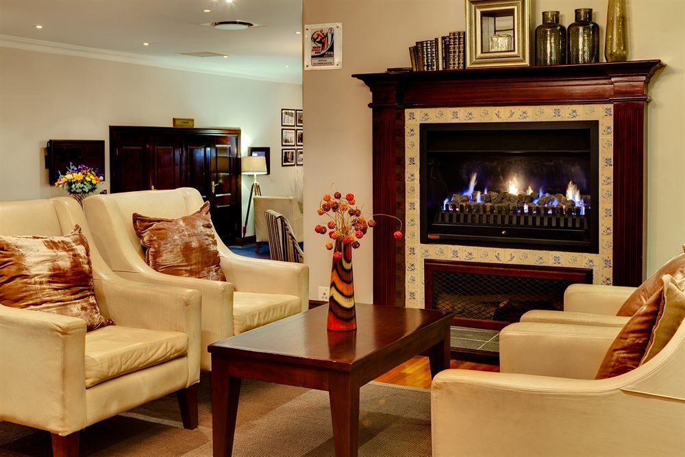 Irene Country Lodge, Autograph Collection Центурион Экстерьер фото A fireplace in a home